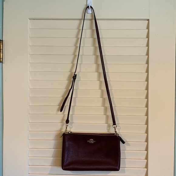 COACH crossbody purse. Leather mahogany/brown. 2 pocket adjustable strap. - Picture 2 of 7